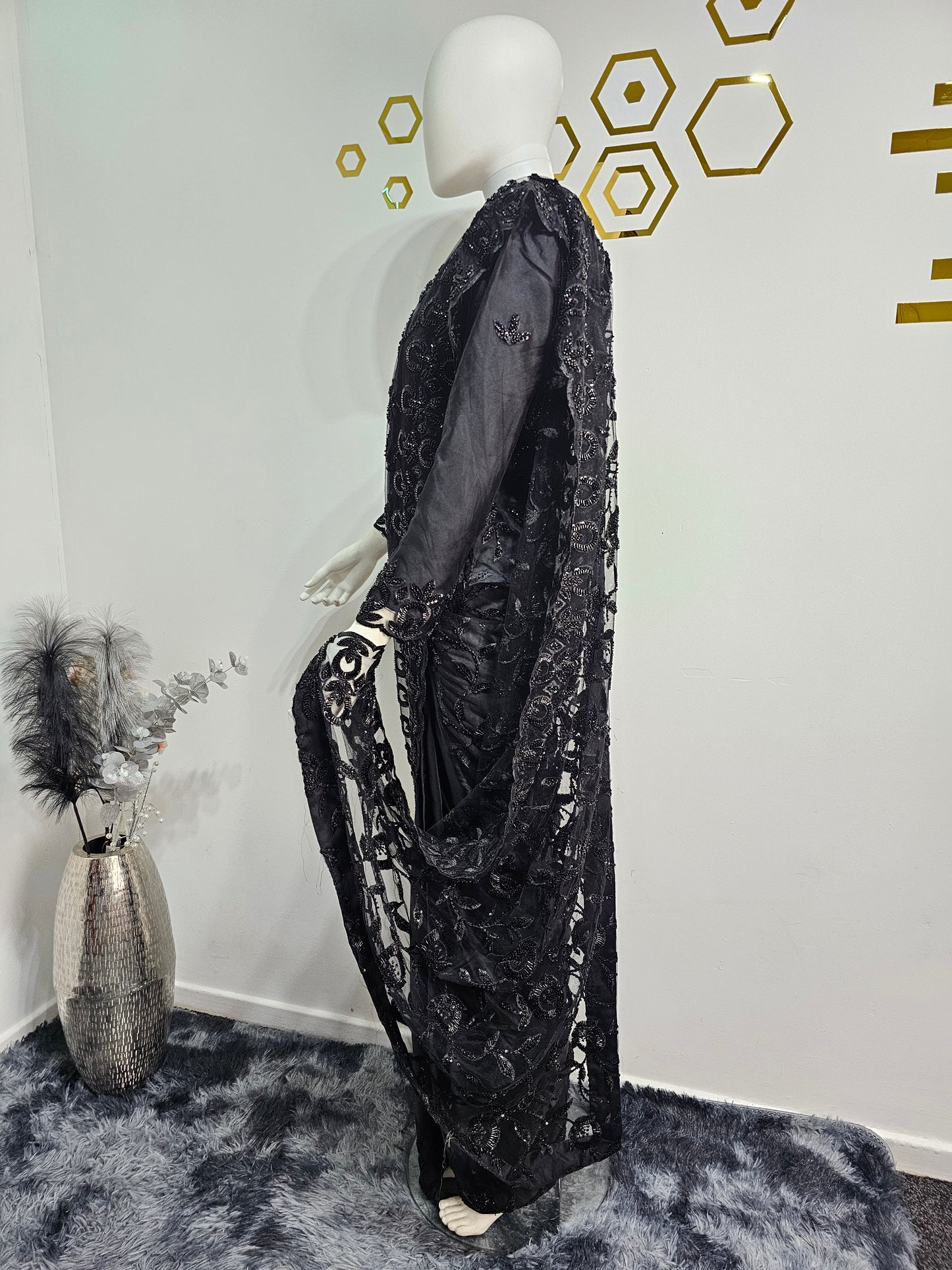 Elegant Black Ready-Made Saree Featuring Intricate Beadwork.