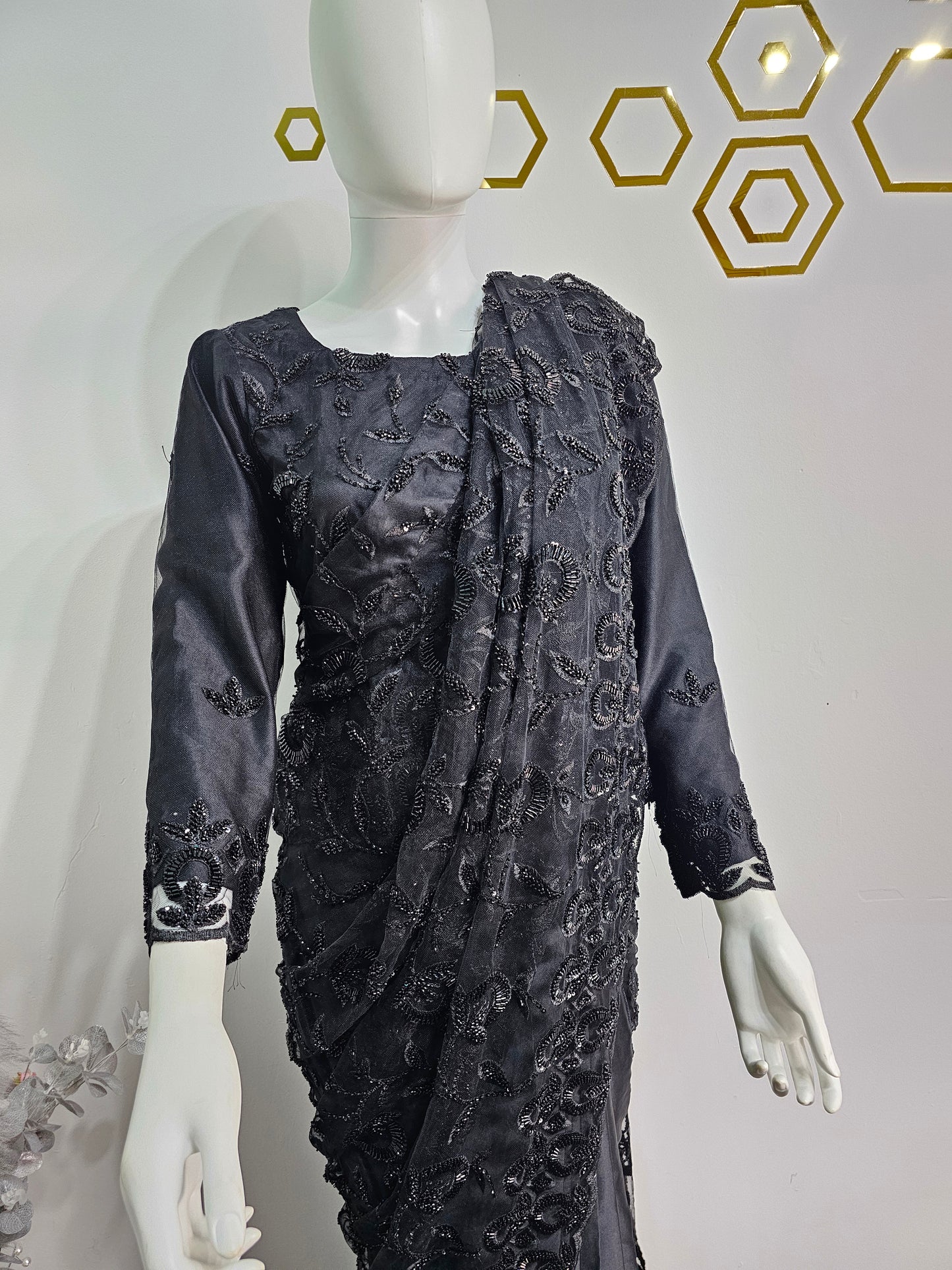 Elegant Black Ready-Made Saree Featuring Intricate Beadwork.